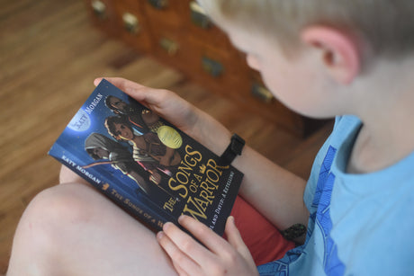 Child looking through Bible Story Retellings Collection