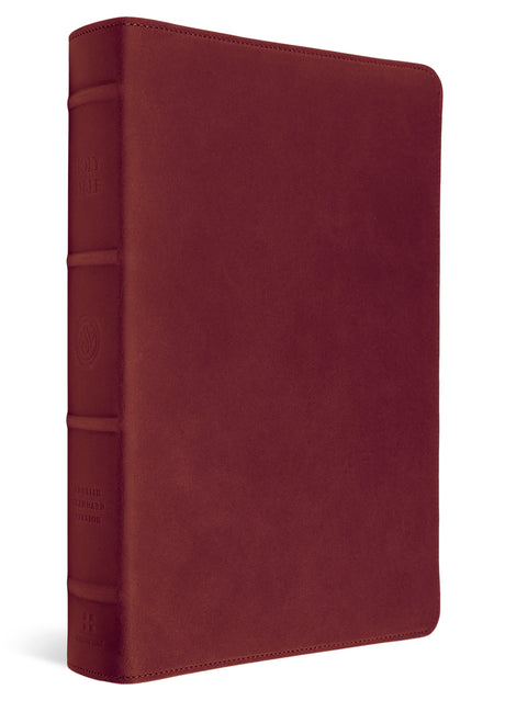 A dark red leather Bible with a textured finish, featuring a full leather cover and a detailed, embossed spine with decorative bands and gold lettering, shown on a white background.