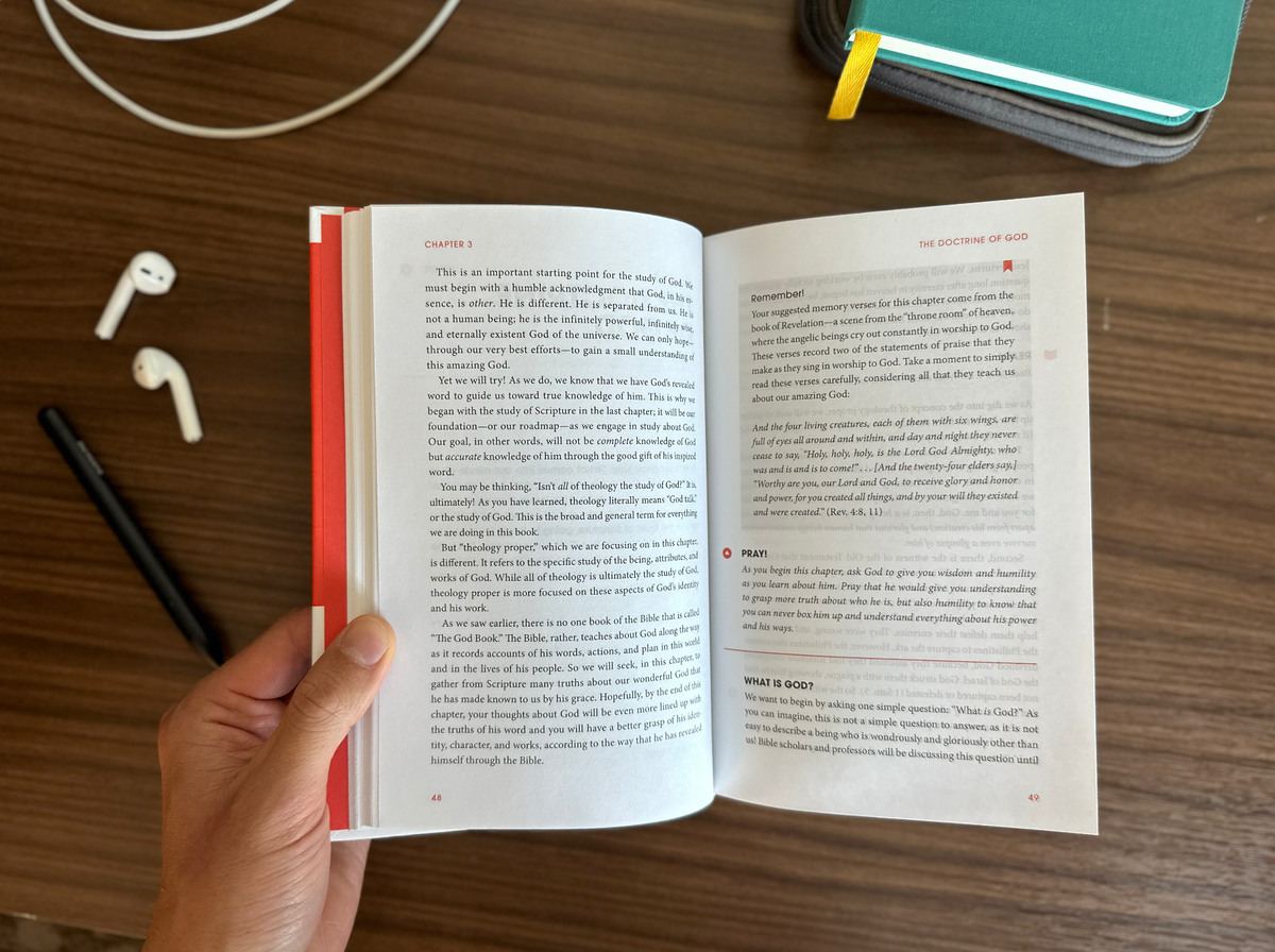 Knowing God's Truth: An Introduction to Systematic Theology lying open to an interior page
