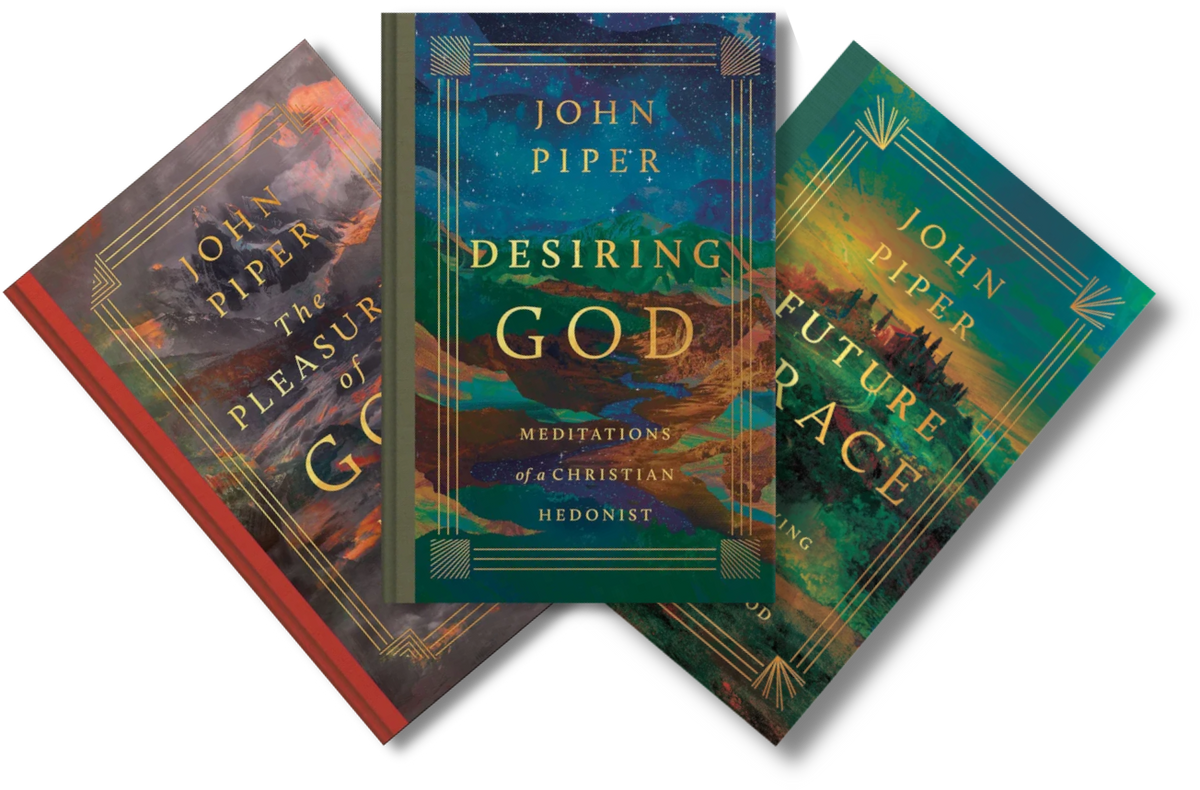Three John Piper books fanned out against a black background: The Pleasure of God, Desiring God, and Future Race. The covers feature richly colored cosmic and landscape-style artwork with gold typography and decorative borders.