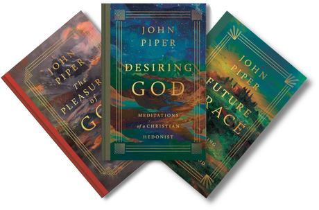 Three John Piper books fanned out against a black background: The Pleasure of God, Desiring God, and Future Race. The covers feature richly colored cosmic and landscape-style artwork with gold typography and decorative borders.